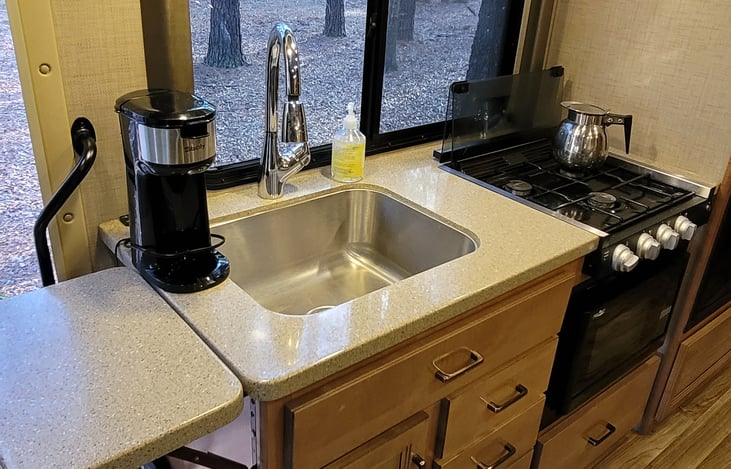 Kitchen with side shelf up.