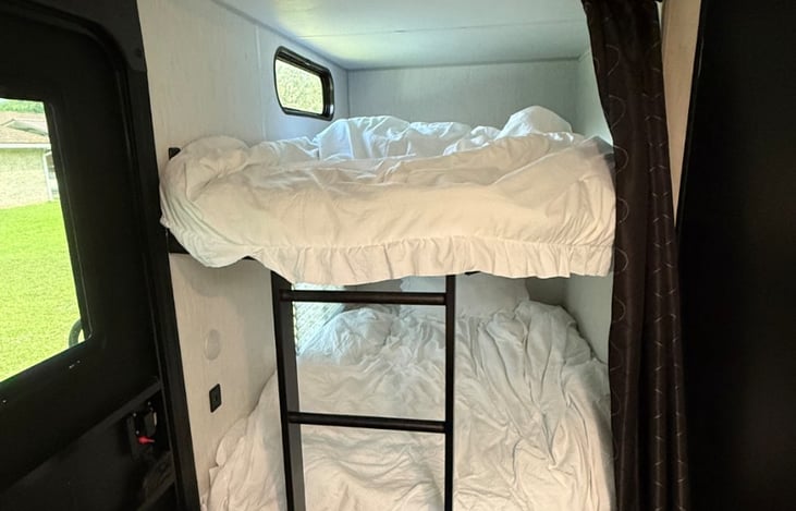Full sized bunk beds. Will sleep either 4 small children or 2 adults