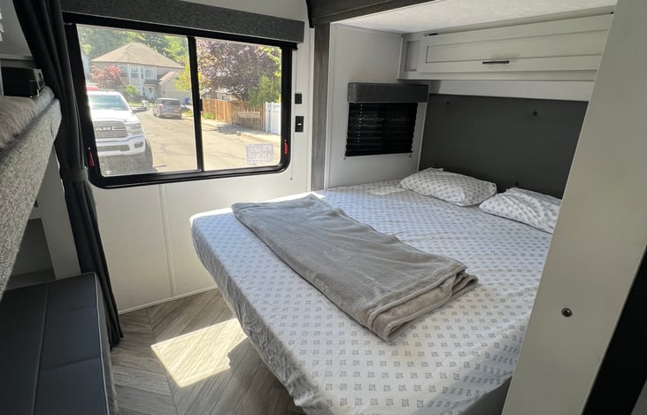 Slide out queen bed.