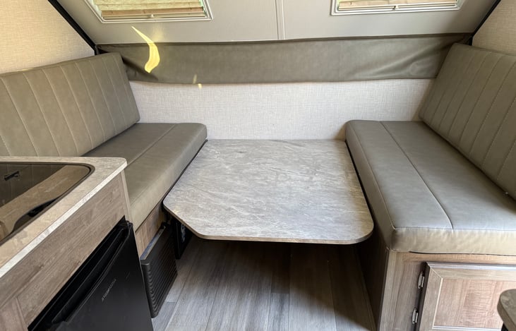 Interior: Dining Space (Table Pops Up)