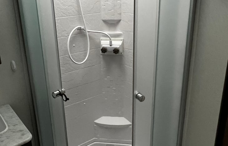 Spacious and tall (I'm 6'3" and fit easily in this shower) shower to wash off the days dirt and grime.