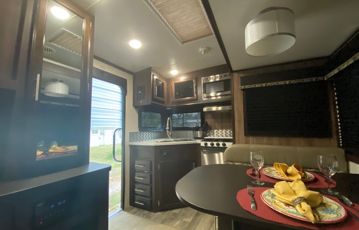 spacious rear kitchen and dinette slides out