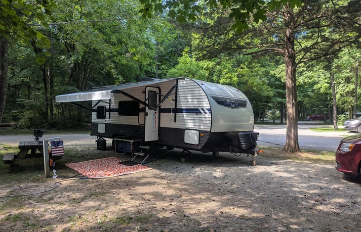 Keep it clean! Outdoor area rug included, located in the front pass through.