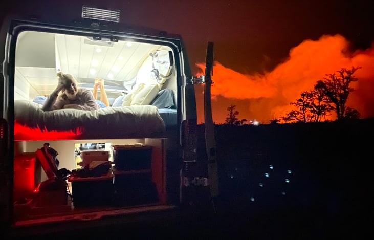 Watch the volcanic glow from your bed at night