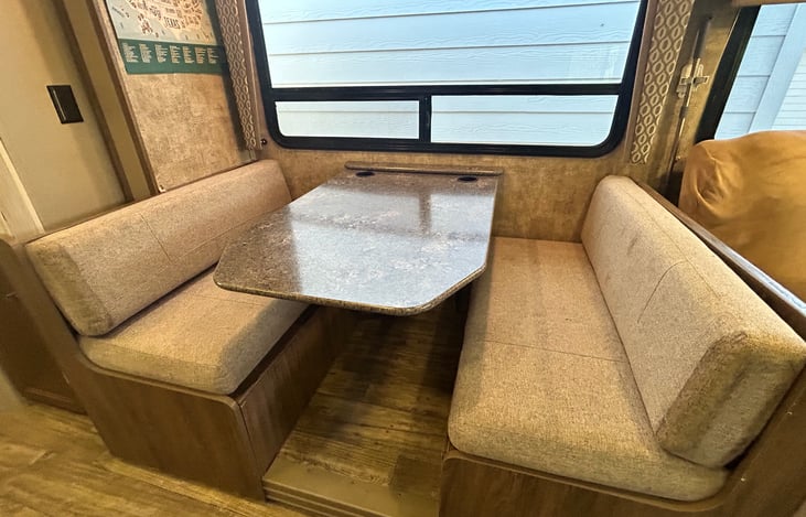 Dinette has 4 seatbelts & converts to full bed