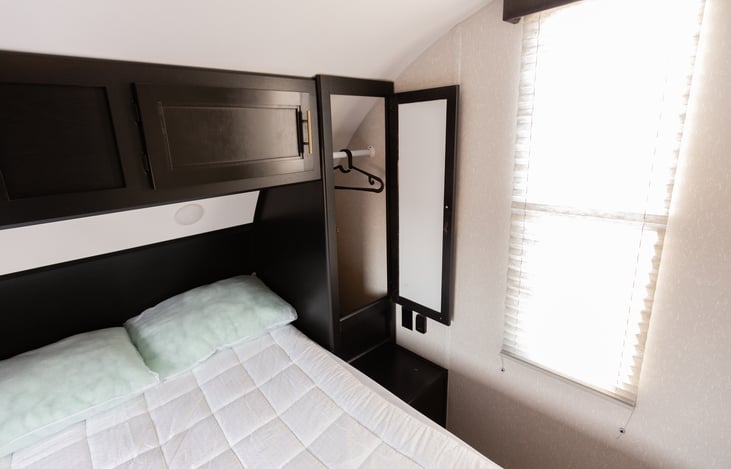 Private master bedroom with queen size bed and closet space