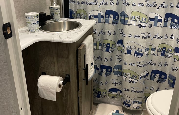 RV toilet paper will be supplied for you. Along with 4 towels and washcloths.