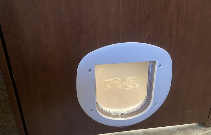 Cat Door Leading into Bathroom