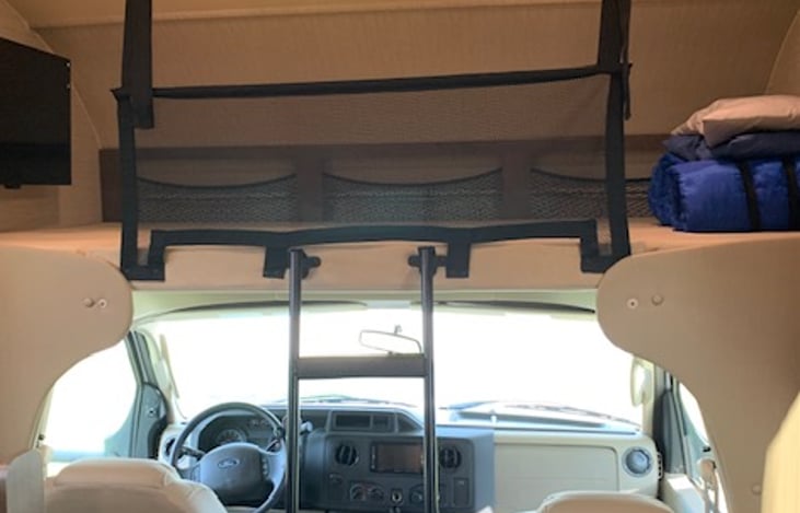 Overhead bunk with optional safety net.