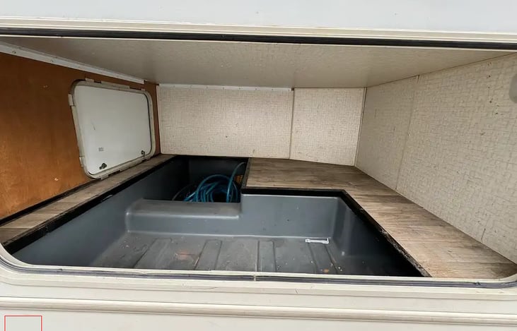 Trunk at rear can be accessed by two access panels.