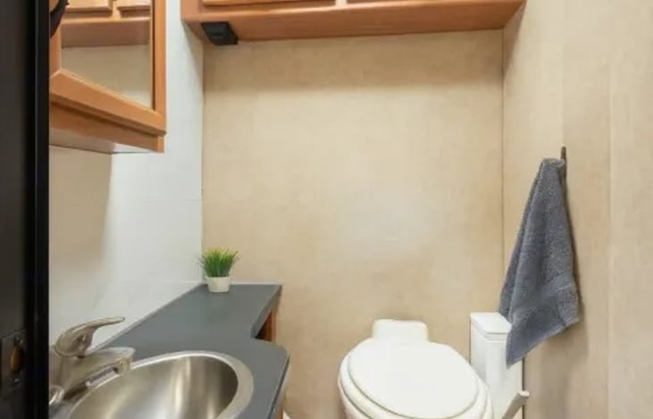 Enjoy a clean, comfortable space to shower and recharge — this festival-friendly RV bathroom keeps you feeling fresh all weekend