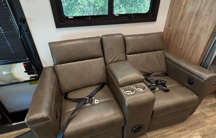 Sofa has a seat belt on each chair
