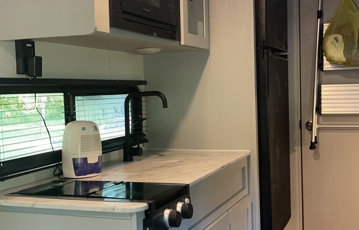 2 burner range, microwave, full size sink