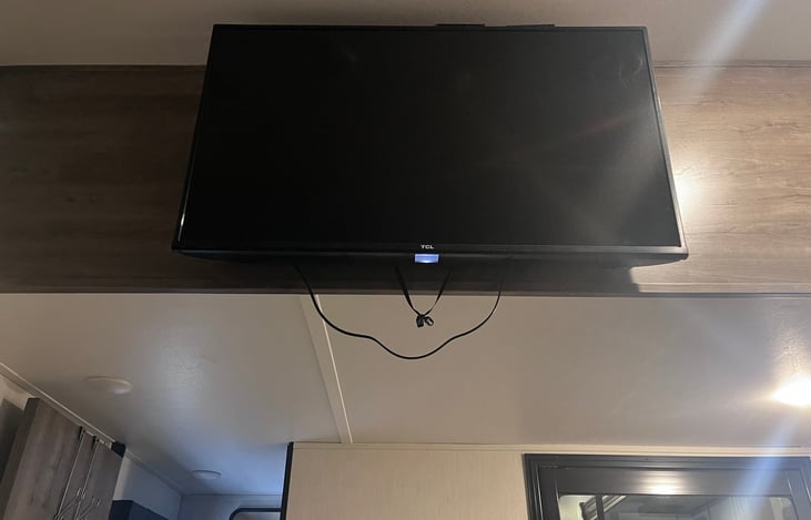 Tv in toy hauler area. This allows for separate movie times for 3 sections of folks. The master, the living, and the toy hauler area!