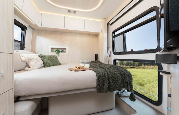 Rear lounge with murphy bed down; bed is 3" narrower than a queen and very comfortable.