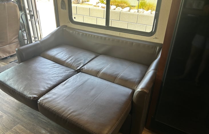 Pull out sofa bed fits 2 adults.