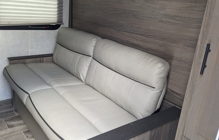 Convertable Sofa w/Murphy bed behind.