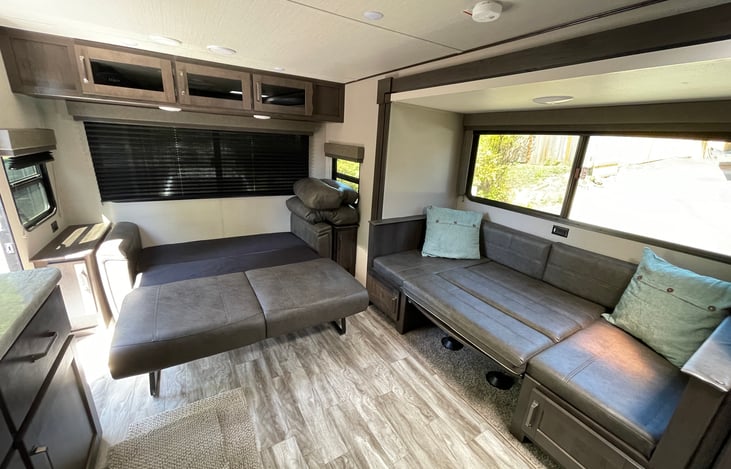 Couch and dinette folded down into beds