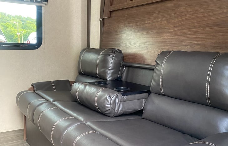 This area is a couch by day and a queen size  Murphy Bed by night.  Extra Memory foam is included in the Murphy Bed  for your comfort.