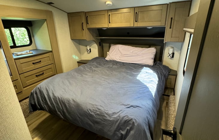 Master bedroom with walkaround residential queen