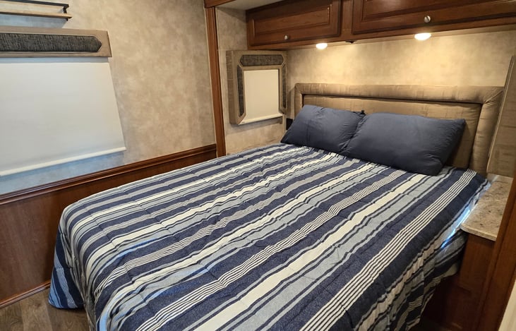 Private Queen bed with plenty of storage and closet space.