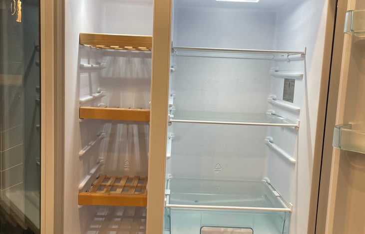 Large fridge and freezer with wine rack
