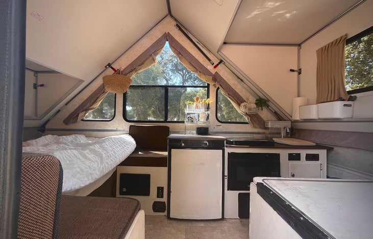 Overall living space in the Aliner pop top rental at KOA Boulevard