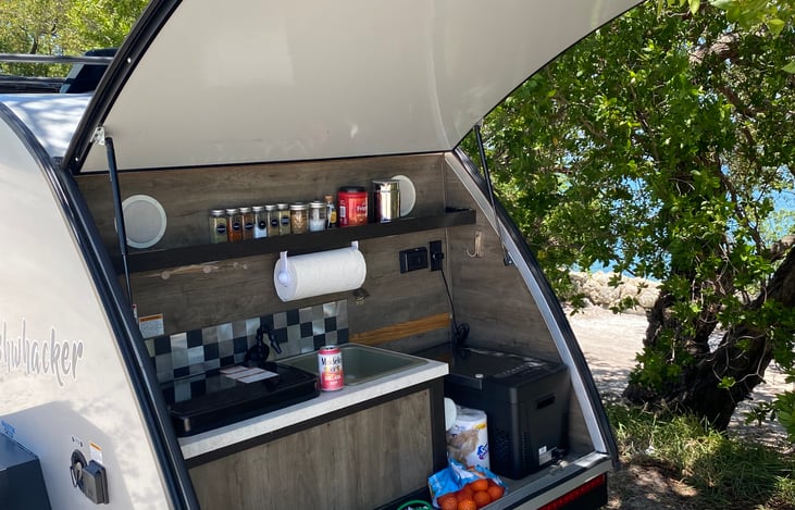 She comes with almost everything you need to prepare delicious meals while outdoors.