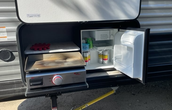 Outside gas connected grill top and mini fridge
