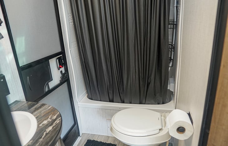 Bathroom stays clean, shower is spacier than you might imagine.