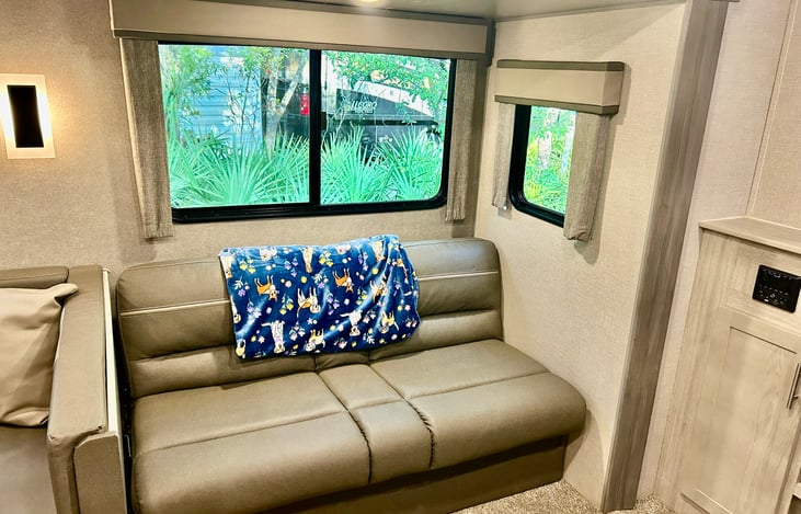 Couch lays out for more sleeping space.