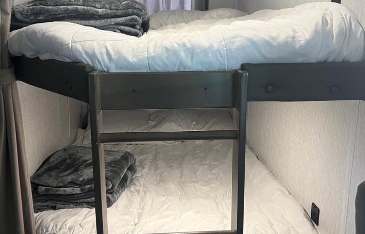 Adult size double bunkbeds. Both equipped with USB ports.