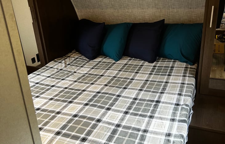 Nice queen bed in master bedroom for your comfort after a long day of concerts, riding, fishing, or whatever you can think of.