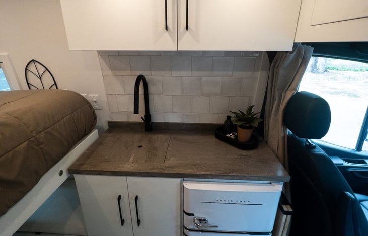 Take your kitchen on the road! Cook delicious meals anywhere with our fully-equipped campervan kitchen, designed for convenience, creativity, and unforgettable flavors during your adventure.