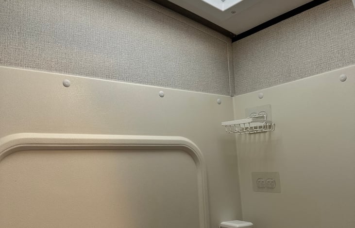 Public showers are available or enjoy one with a sky light.