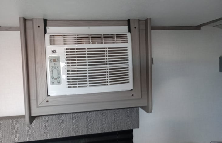Air conditioning and heating above the bed