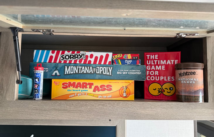 Help yourself to any of these games that are above the couch.