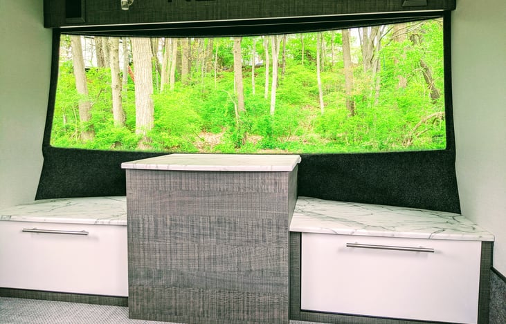 The HUGE window up front makes this trailer feel much larger than it actually is. Open up the privacy blinds to mountains, the ocean, or whatever outdoor adventure you want!