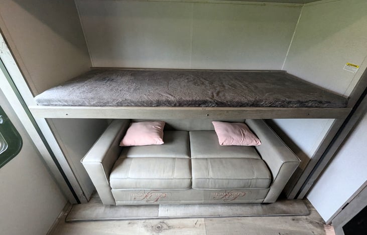 Spacious galley and fully-equipped kitchen. Plenty of room for everyone. Private bunkhouse and private bedroom on opposite ends. Pop-up TV to keep everyone entertained. Ample storage.