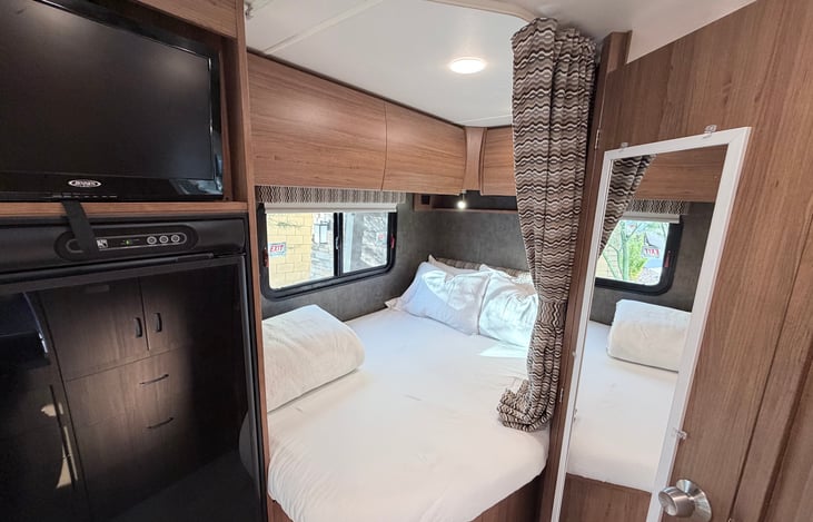 Comfortable bed- with fresh linens , pillows and blankets