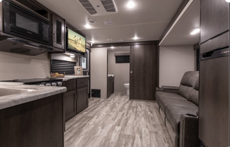 We have removed the recliners and up a small love seat convertible bed will update pics