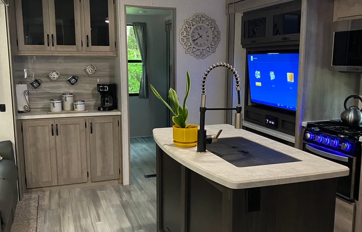 Large kitchen, dining, and living space located between the bunk house and master bedroom