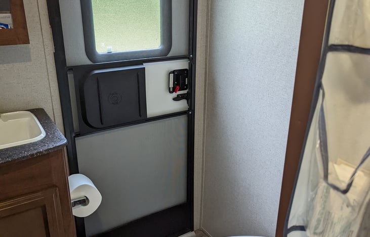 2nd Exit - In bathroom.  There is a tub, sink and toilet.