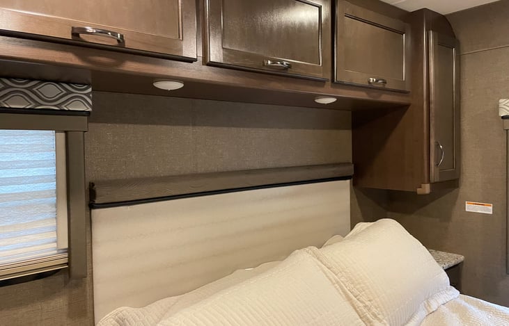 Overhead storage master bedroom