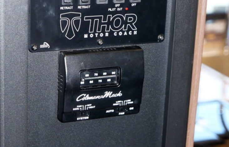 master panel to control heat, A/C, check black/grey/fresh water levels, retract and expand slide outs, etc.