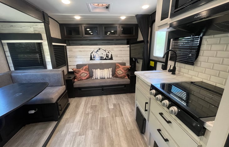 Living Space: Storage above and below sofa.