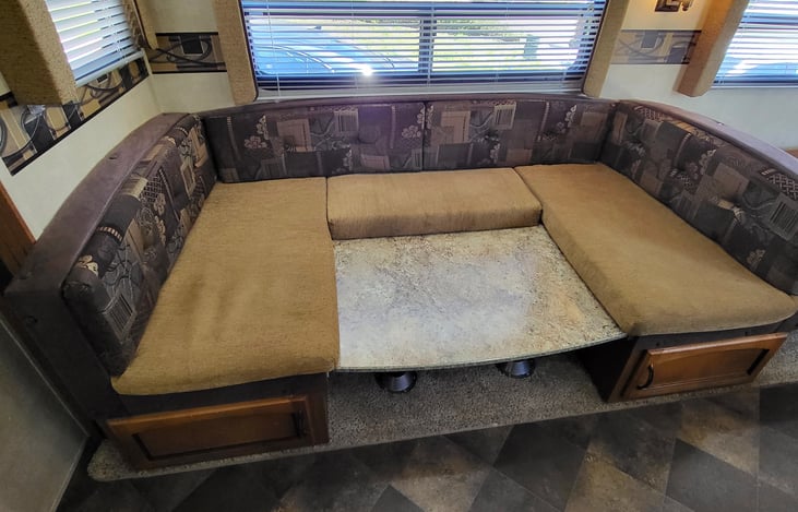 ***STEP 2 of 3*** Turn your dining table into a sleeper bed in no time. The table top fits snug into the square area between the cushions. 
***SEE STEP 3***