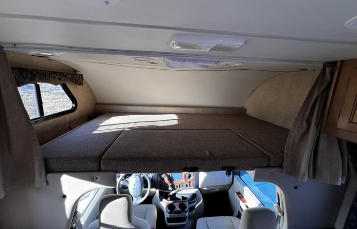 Bunk over cab with curtains for privacy