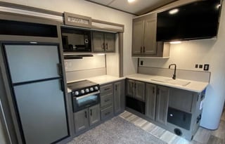 set up and deliver kid friendly toy hauler