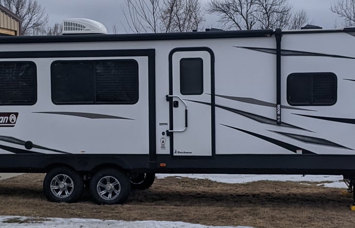 29' Trailer with two slides, one on each side.